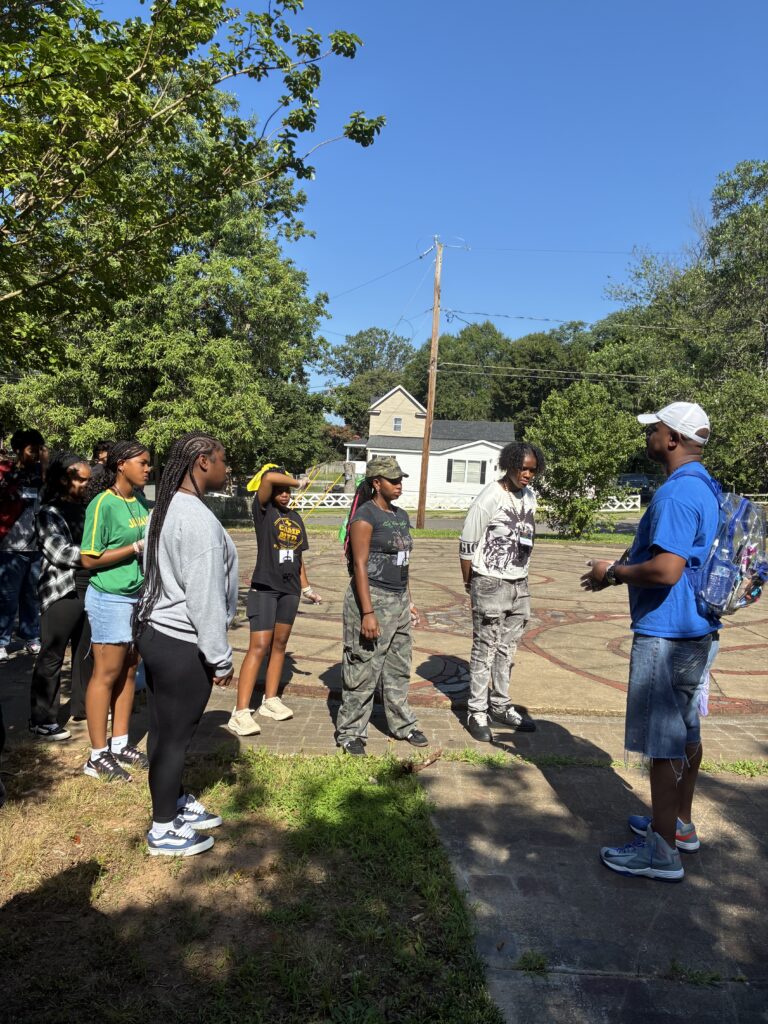 Youth from First Baptist and First Waughtown Baptist Churches came together in service at Sunnyside Ministry, demonstrating faith in action through community outreach.