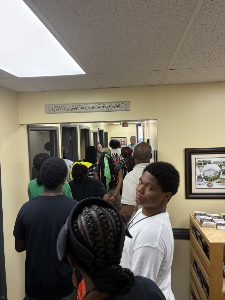 Youth from First Baptist and First Waughtown Baptist Churches came together in service at Sunnyside Ministry, demonstrating faith in action through community outreach.